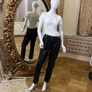 Soft leather pants like new with zippers from top to bottom wi/ zipper pockets